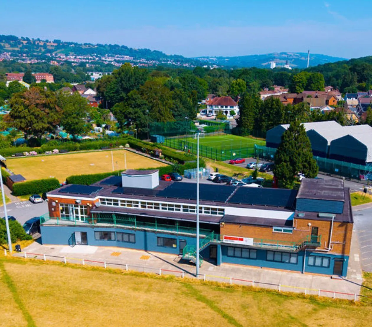 The whole Woodland Road complex: the Hwb building, 3G pitch, padel centre and bowling green
